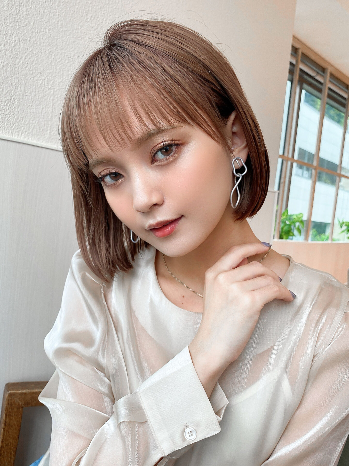 ぱつっとボブでも柔らかく。大人に似合う丸みフォルム